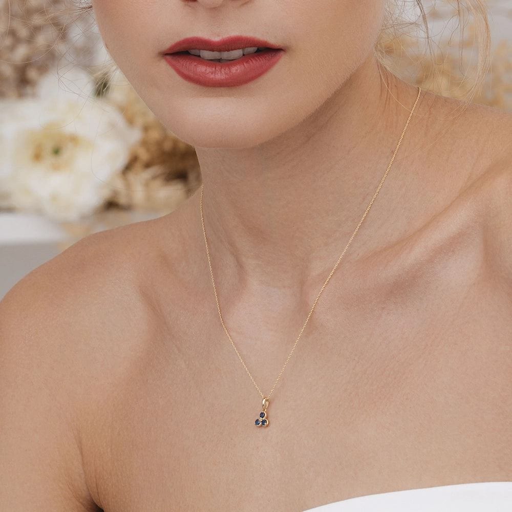 floral-sapphire-three-stone-pendant-necklace-in-9ct-yellow-gold-132p1914019 on Model