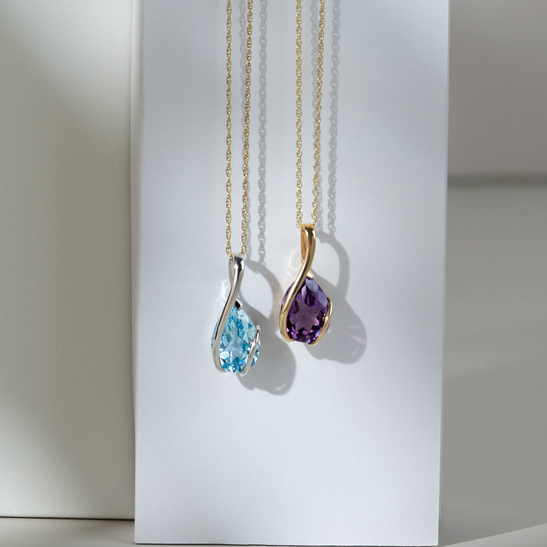 Classic Pear Blue Topaz Pendant in 9ct White Gold