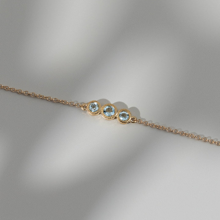Classic Round Aquamarine Three Stone Milgrain Bracelet in 9ct Yellow Gold