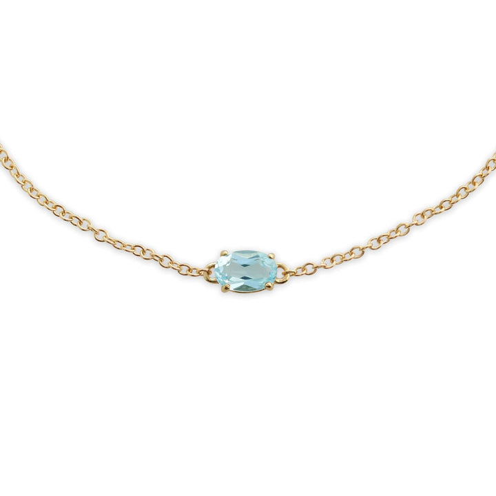 Classic Oval Blue Topaz Single Stone Bracelet in 9ct Yellow Gold - Gemondo